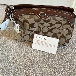 Coach signature collection wristlet. Never used